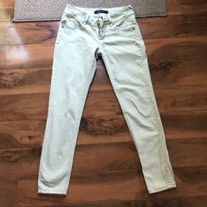 Green colored jean pants